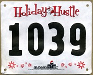 Holiday Hustle 2011-12  The 2011 Holiday Hustle 5K. Maybe a new Christmas tradition along with the Belle Isle New Years Eve race!
